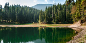 Breathtaking view of lake high in Carpathian mountains. Copy space.